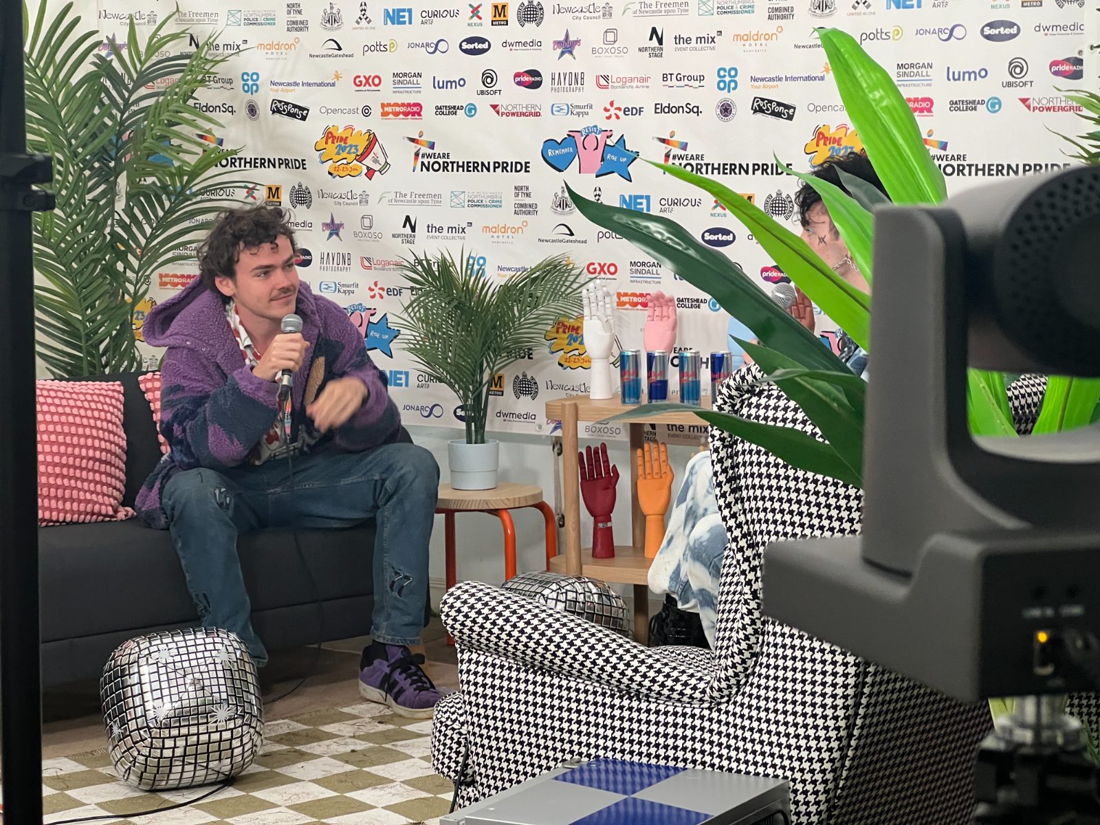 Live interview being recorded in the studio dwmedia built inside a marquee at Northern Pride, furnished by IKEA