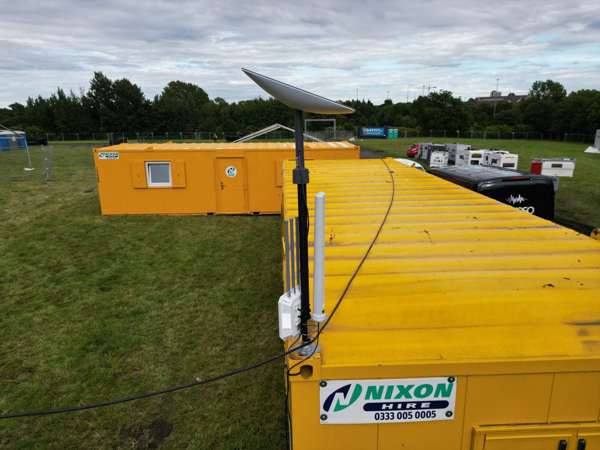 Starlink, access point and mobile mast rigged together on a shipping container for bonded connectivity